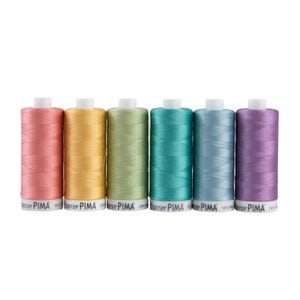 May include: A row of six spools of thread in various pastel colors: pink, gold, green, teal, light blue, and purple. Each spool has a white top and a label that reads "Superior PIMA".