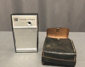 Eight Transistors Continental AM FM Portable Pocket Handheld Radio Silver and Case