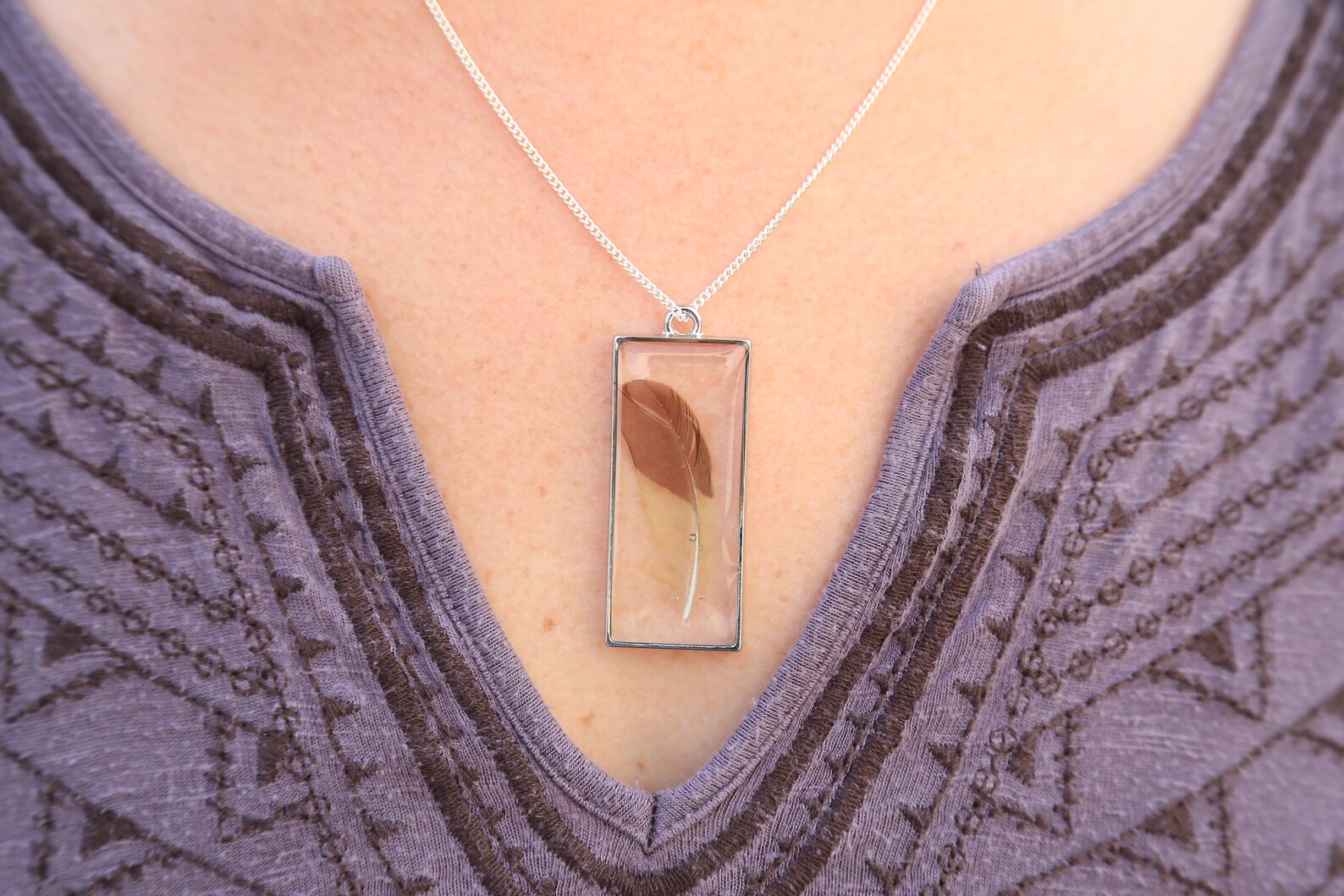 Single feather in resin and silver Etsy