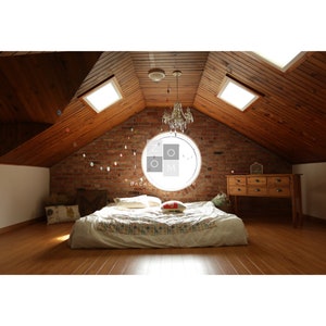 May include: A cozy bedroom with a bed, a wooden dresser, and a brick wall. The room has a wooden ceiling with skylights and a chandelier. The bed has a patterned comforter and pillows. The room is well-lit and inviting.