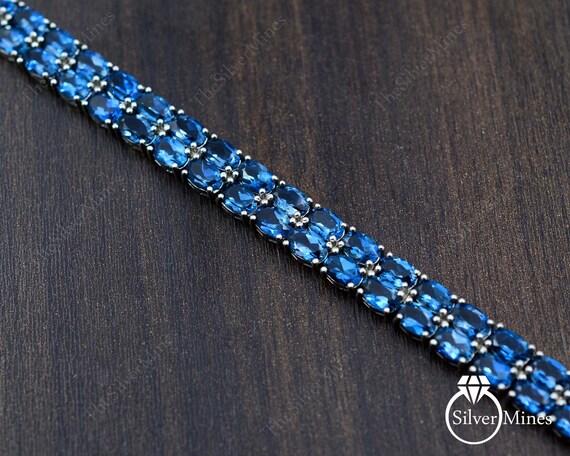 天然 ロンドンブルートパーズ ブレスレット レディース イエローゴールド 加工 天然石 11月 誕生石 お守り 誕生日プレゼント 女性 40代 50代 ブランド WINS HOUSE®︎ SWAN SILVER BRACELET London blue topaz スワン