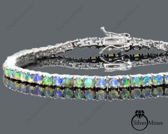 Natural Ethiopian Opal Tennis Bracelet, Opal Tennis Bracelet, Classic Tennis  Bracelet at Rs 7850/piece | जेमस्टोन का ब्रेसलेट in Jaipur | ID: 24123446433