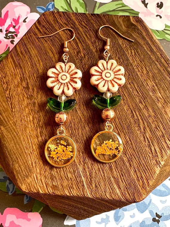 Copper Garden Whispers Earrings – Rose Gold Hematite, Czech Glass Flowers, Orange Dried Flowers in Resin – Garden-Inspired Crystal Earrings