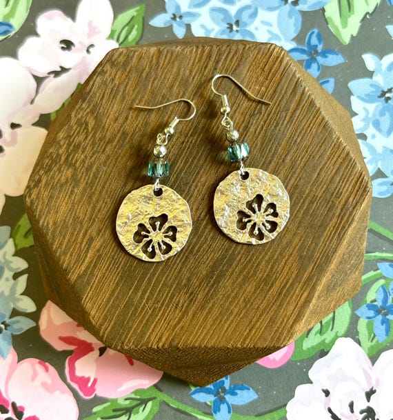 Island Blue Radiance Earrings – Silver Hibiscus Flower Dangles with Czech Cathedral Glass and Hematite – Hypoallergenic Stainless Steel