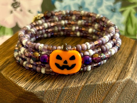 Halloween Gemstone Coil Bracelet: Purple Hematite, Czech Glass, Pumpkin Charm