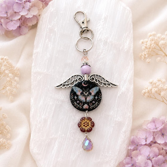 Heavenly Wings of Grace Purse Charm, Kunzite Gemstone Keychain, Angel Wings Bag Charm, Artisan Moth Wood Bead, Celestial Gift