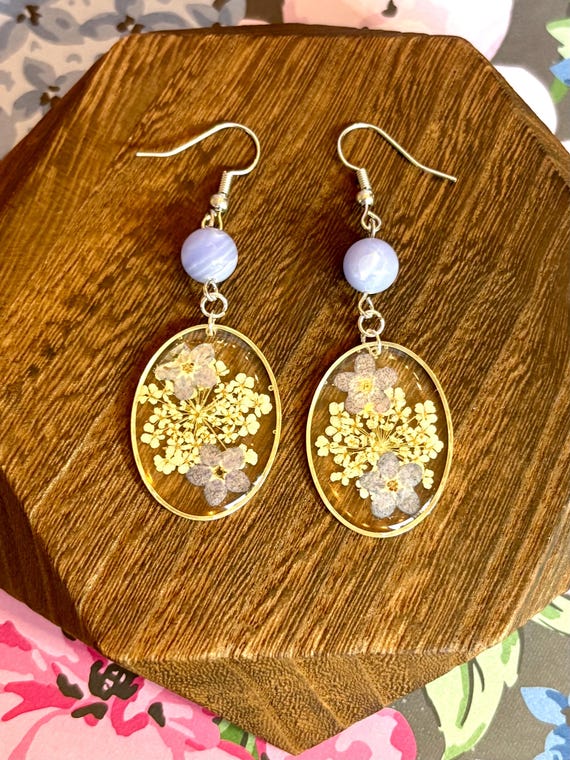 Peaceful Bloom Earrings – Blue Lace Agate, Pressed Flowers, Gold Tone, Hypoallergenic 316L Stainless Steel, 2.5 Inches