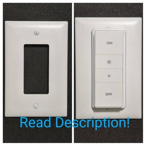 May include: White plastic light switch with a rectangular faceplate. The switch has four buttons: ON, two dimmer buttons with sun icons, and OFF.
