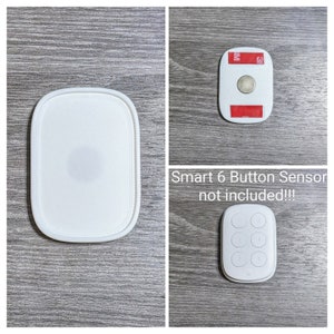 Puede incluir: Sensor de hogar inteligente redondo blanco con un respaldo adhesivo blanco. El sensor está diseñado para montarse en una pared o techo. El sensor no está incluido con el dispositivo de hogar inteligente.