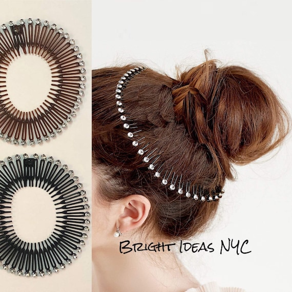 Black flexi comb sport hair band approx 11 cm.