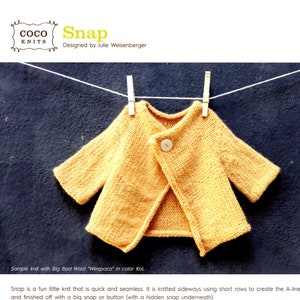 May include: A knitting pattern for a Snap cardigan for babies and toddlers. The pattern is written in English and includes instructions for sizes 3-6 months, 6-12 months, 18 months, and 24 months. The pattern is designed by Julie Weisenberger and is available on cocoknits.com.