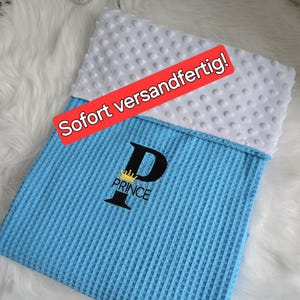 Baby blanket made of waffle pique in light blue and Minky plush in white