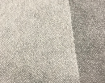Light weight non woven pellon fusible interfacing  ( iron on ) white 60” x 10 yards