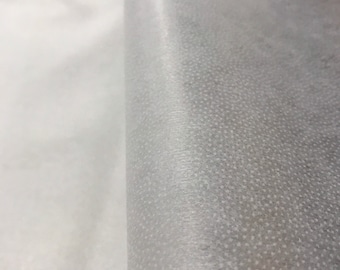 White non woven light weight pellon fusible interfacing (iron on)  60” x 5 yards