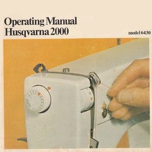 May include: Close-up of a white sewing machine with a red dot on the dial. A hand is threading the machine with red thread. The text "Operating Manual Husqvarna 2000 model 6430" is visible at the top of the image.