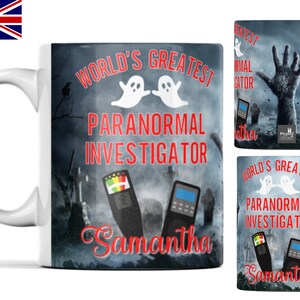 May include: White ceramic mug featuring a black and white image of a graveyard, ghosts, and paranormal investigator's equipment. The text "World's Greatest Paranormal Investigator" is in red and the name "Samantha" is in red cursive.