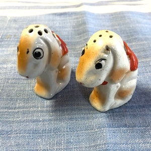 Cute vintage dogs salt and pepper shaker set. Made in Japan.