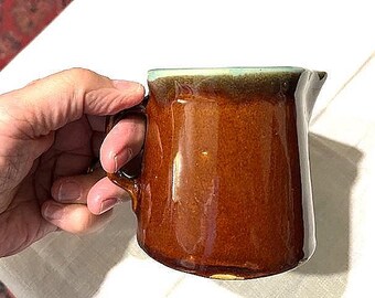 Nice brown and green glazed creamer or small pitcher