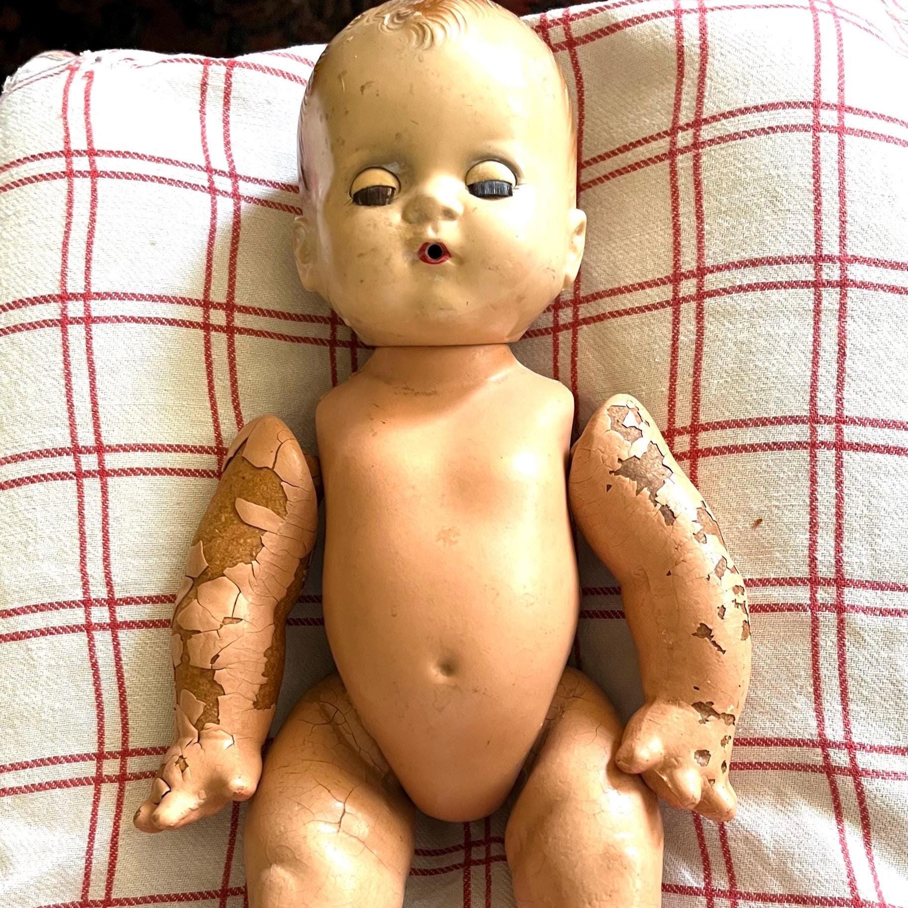 Vintage doll -parts are unconnected