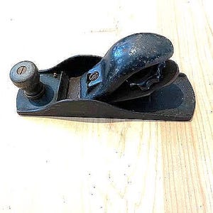 Vintage wood plane. In good working order.