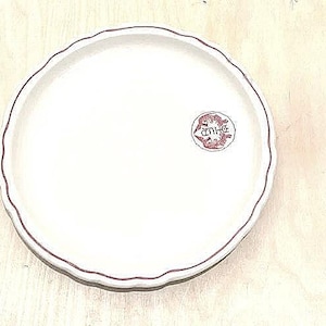 Sterling china restaurant ware plate with phoenix motif and scalloped border