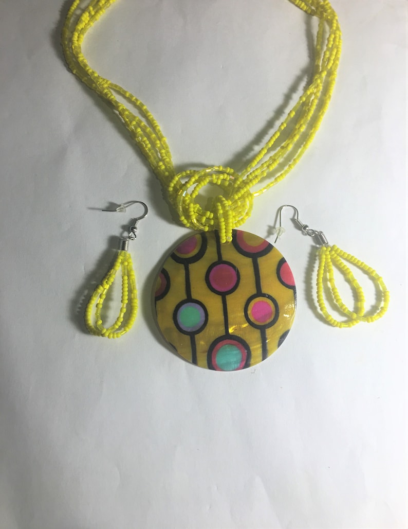 Yellow Shell Disc Reflections Pendant with Multi Color Design Beaded Multi Strand Necklace and earrings Set