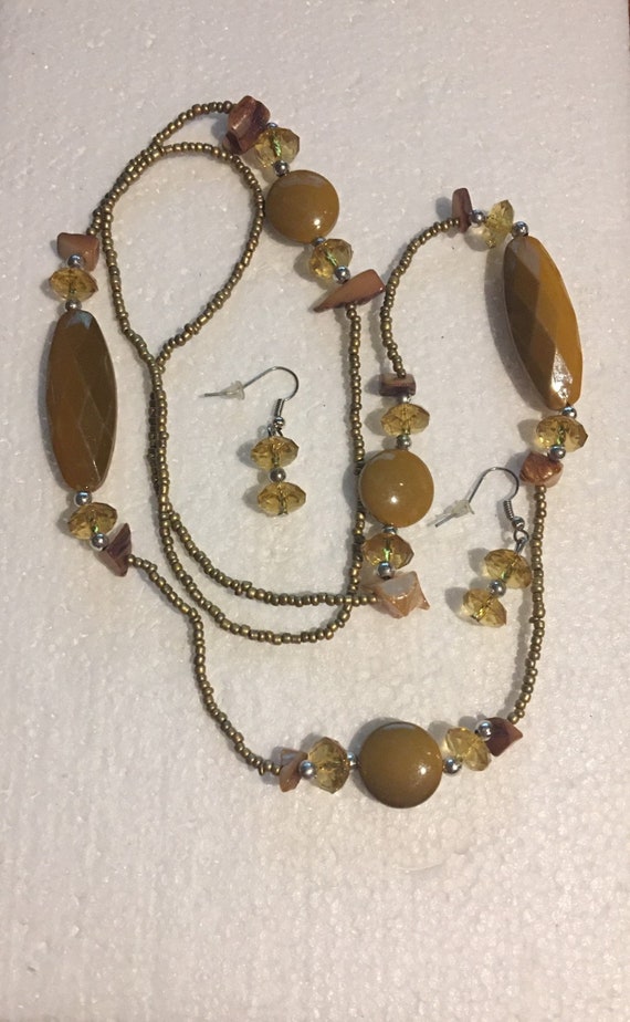 mustard yellow and silver Gem