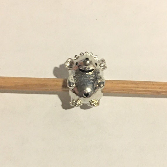 Nino the shop hedgehog charm