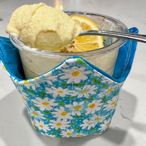 Adorable teal and white daisies ice cream cozies. Perfect for Ninja Creami pints- two sizes to pick from. Limited amount!