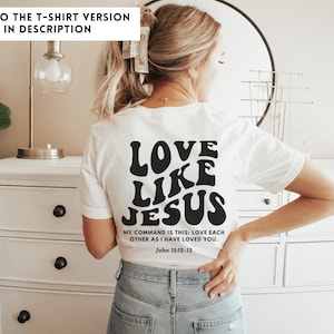 May include: White t-shirt with black text that reads "LOVE LIKE JESUS" and a bible verse from John 15:12-13. "MY COMMAND IS THIS: LOVE EACH OTHER AS I HAVE LOVED YOU."