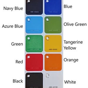 Puede incluir: Una carta de colores con 10 colores diferentes, incluyendo azul marino, azul celeste, verde, rojo, negro, azul, verde oliva, amarillo mandarina, naranja y blanco. Cada color est&aacute; etiquetado con su nombre y un c&oacute;digo ABS correspondiente.