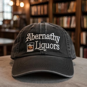 Embroidered Abernathy Liquors hat, Sunrize on the Reaping inspired cap, Hungrs Game fan gift, Movie & Book Lover Gift