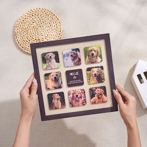 Puede incluir: Un collage de fotos cuadrado con marco marr&oacute;n oscuro que presenta nueve fotos cuadradas de un golden retriever. La foto central tiene el nombre "Nellie" y el texto "Once by my side, forever in my heart". El marco lo sostiene una persona.