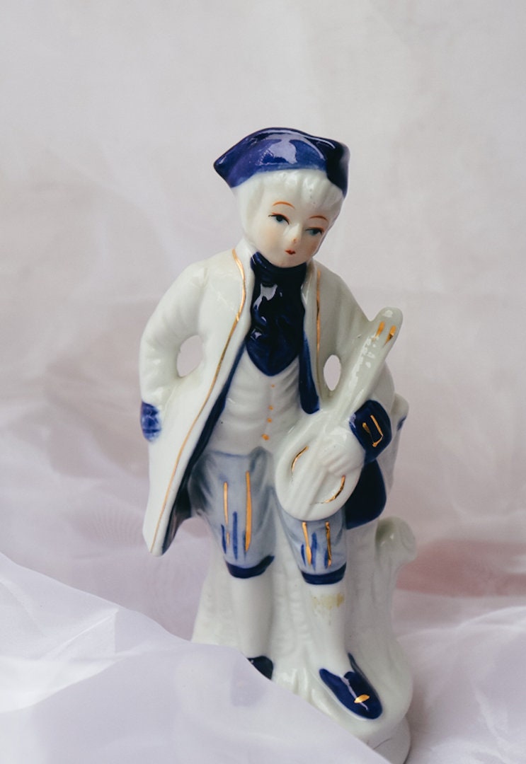 Vintage Porcelain Figurine, Boy Holding a Musical Instrument, From the ...
