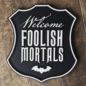 Welcome Foolish Mortals 3D Wood Halloween sign.