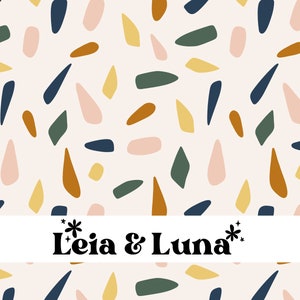 Könnte beinhalten: Ein nahtloses Muster mit abstrakten Formen in verschiedenen Farben, darunter Rosa, Gelb, Orange, Grün und Blau. Der Hintergrund ist hellbeige. Der Text "*Leia & Luna*" ist mittig unten im Bild platziert.