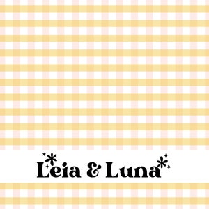 May include: A yellow and white gingham background with the text "*Leia & Luna*" in black.
