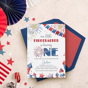 May include: A rectangular birthday invitation card with red, white, and blue fireworks and stars. Text reads: our little FIRECRACKER is turning ONE. PLEASE JOIN IN THE CELEBRATIONS FOR Jackson SATURDAY 4TH OF JULY 10AM - 12PM AT JACKSON'S HOUSE 44 LIBERTY BELL DRIVE, PATRIOT TOWN RSVP LAUREN 123-000-0000 BY 20.06