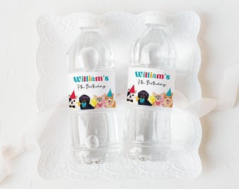 May include: Two clear plastic water bottles with white caps, each featuring a label that reads William's 7th Birthday. The labels display colorful illustrations of four dogs wearing party hats and bow ties against a white background.