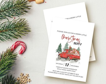 May include: A white rectangular Christmas party invitation card featuring a red pickup truck carrying gifts and pine trees. The text reads: Please join us for a merry little Christmas party, Saturday 17 December, 7:30pm at Santa's Workshop, 123 Elf Road, North Pole. RSVP Mrs. Claus 517-447-2682 by 08.12. Please bring a secret Santa gift valued at $20.