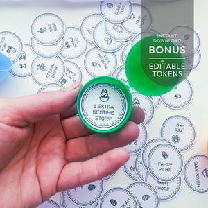 May include: A hand holds a green container with a white circle that reads "1 EXTRA BEDTIME STORY" and a bunny graphic. Scattered around are white circular tokens with various activities and the text "INSTANT DOWNLOAD BONUS EDITABLE TOKENS".