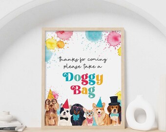 May include: A rectangular sign featuring watercolor paint splatters in pink, yellow, and blue. The text reads: thanks for coming please take a Doggy Bag. Below, six illustrated dogs wear party hats, bow ties, glasses, and a top hat.