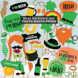 May include: A selection of 39 St Patrick's Day photo booth props on sticks. The props include speech bubbles, shamrocks, hats, glasses, moustaches, and beer mugs. The props are in green, orange, black, and gold.