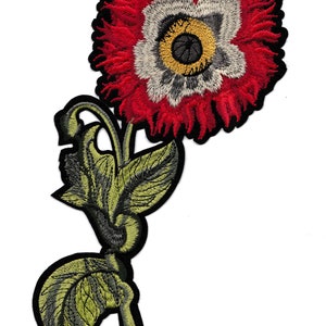 Opstrijkbare badge op de rug met grote bloemenpatch op de achterkant