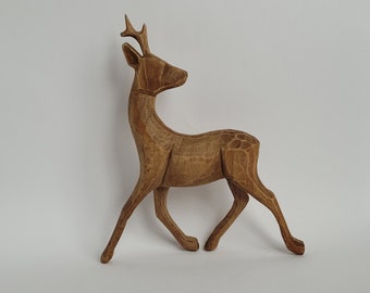 Handcarved deer figurine