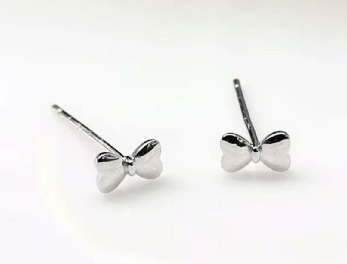 Bow-Shaped Sterling Silver Filigree Dangle Earrings - Happy Bows | NOVICA