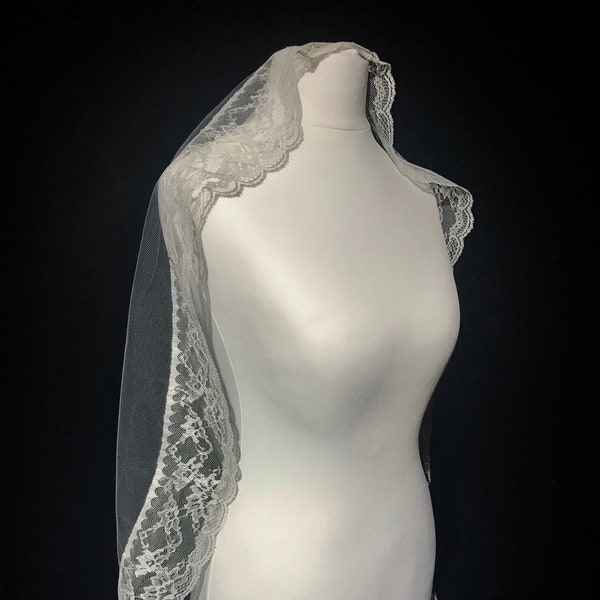 Lace edge mantilla bridal veil, soft Italian tulle with delicate lace edging and a metal hair comb.