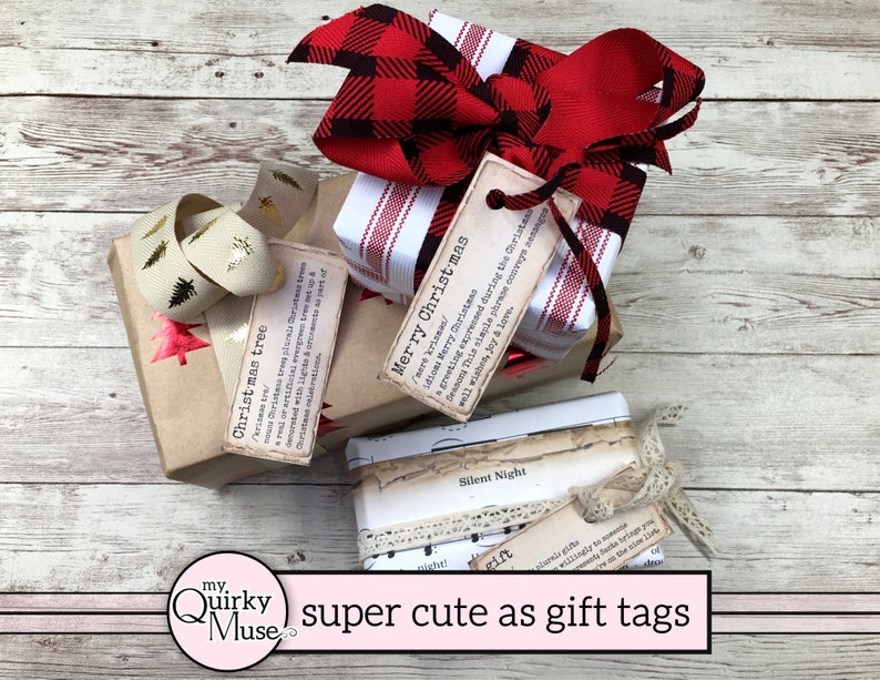 May include: Three gift-wrapped boxes with vintage-style gift tags. The tags have text that reads "Christmas tree", "Merry Christmas", and "Silent Night".
