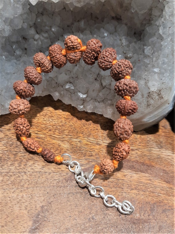 14 Mukhi Rudraksha and Blue Sapphire Bracelet for Third-eye Chakra to  Develops a strong sense of will and discernment to aid the right decision  making - Engineered to Heal²