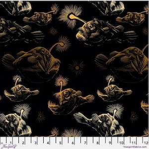 May include: Gold and black fabric with a repeating pattern of anglerfish. The fish are outlined in gold and have a black interior. The background is black.